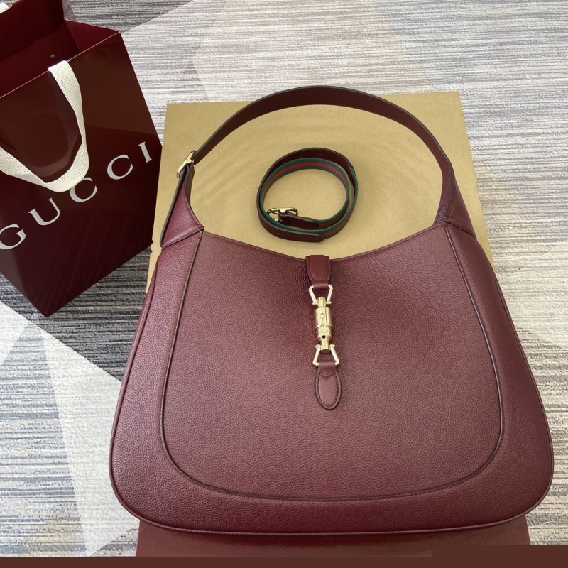 G*u*i top handle bags
